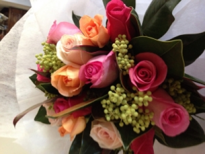 Colourful roses - An assortment of Colourful roses in a beautiful bouquet .