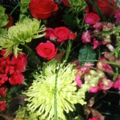 Bright Sensation  - Seasonal selection of quality flowers in tones of deep bright orange, pinks and coral with different shades of green and accented with a mixture of foliage.