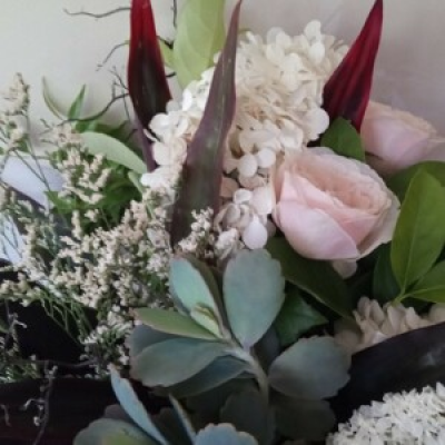 Natural Splendor  - Contemporary beautiful selection of naturally grown flowers and foliage and succulents in a contemporary design arranged as a bouquet unless specified. Colour theme neutral tones unless specified. 