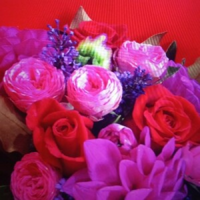 Simply stunning - An assortment of seasonal flowers in the rich vibrant Deep colours of gems with minimal greenery arranged as a posy or bouquet or arrangement.